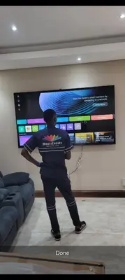 MultiChoice accredited technician setting up smart TV